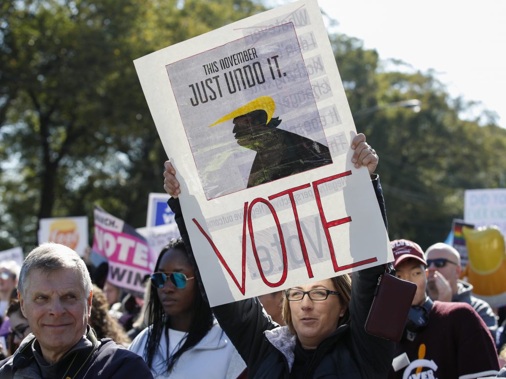 Women gather for a rally and march at Grant Park on Saturday in Chicago to urge voter turnout ahead of the midterm elections. Women gather for a rally and march at Grant Park on Saturday in Chicago to urge voter turnout ahead of the midterm elections. (Kamil Krzaczynski/AFP/Getty Images)