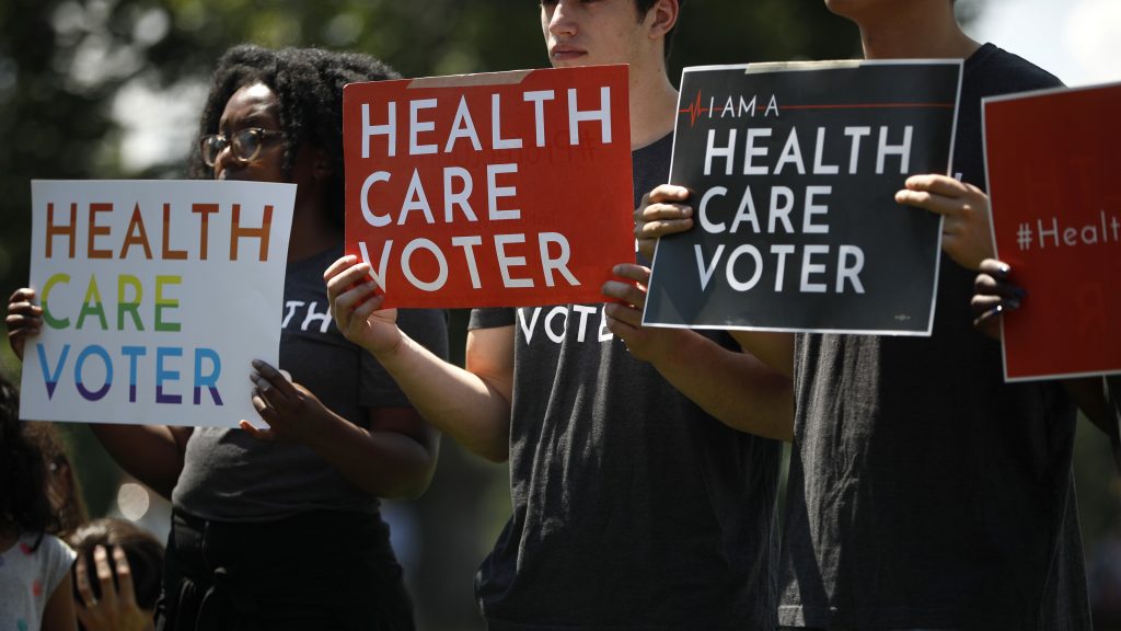 Demonstrators hold signs as Democratic leaders speak with reporters outside the U.S. Capitol June 26, 2018, in Washington, D.C. Demonstrators hold signs as Democratic leaders speak with reporters outside the U.S. Capitol June 26, 2018, in Washington, D.C. (Aaron P. Bernstein/Getty Images)