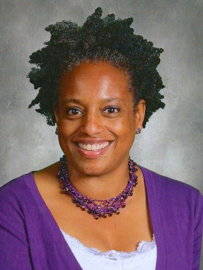 An upclose photo of a Stephanie Ingram smiling.