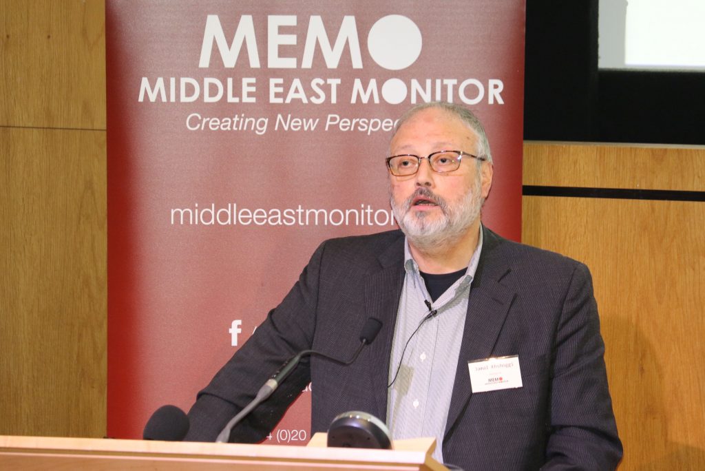 Saudi journalist Jamal Khashoggi, pictured speaking at an event in September, died after a fight broke out in the Saudi Arabian Consulate in Istanbul earlier this month, according to Saudi state TV. (Middle East Monitor via Reuters)