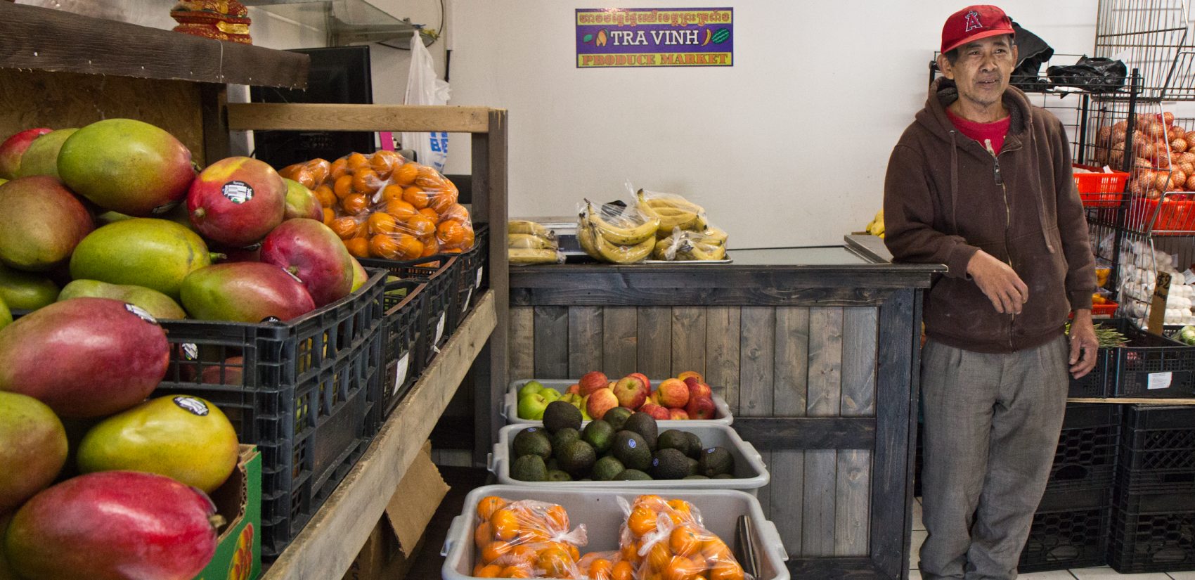 Sophiap Thach, former owner of Tra Vinh produce market, recently gave the business to his daughter to run. (Kimberly Paynter/WHYY)