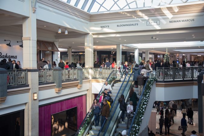 Shoppers pass through the crowds on Black Friday at the King of Prussia Mall in Pennsylvania November 23rd 2018. (Emily Cohen for WHYY)