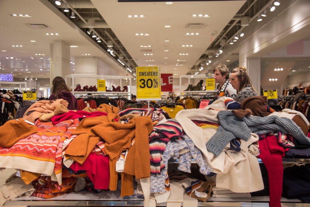 Sweaters are strewn about at Forever 21 on Black Friday at the King of Prussia Mall. (Emily Cohen for WHYY)