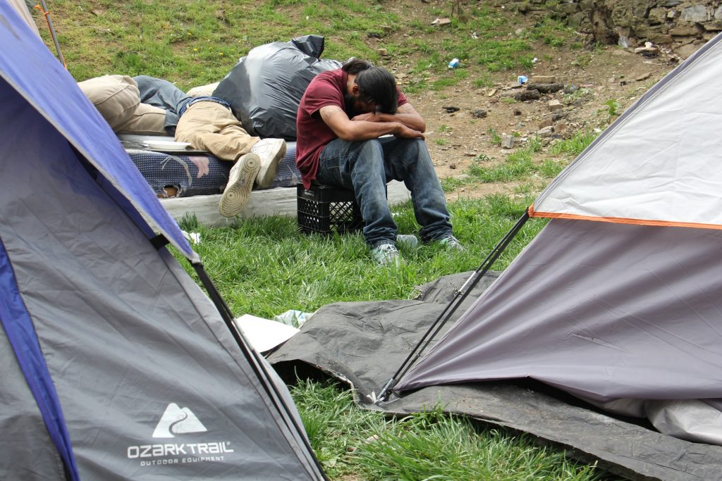 A heroin encampment in a vacant lot on Kensington Avenue was cleared out by the city in May. (Emma Lee/WHYY)