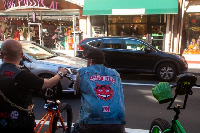 Jersey Devils talk to curious passerbys on South Street (Brad Larrison for WHYY)