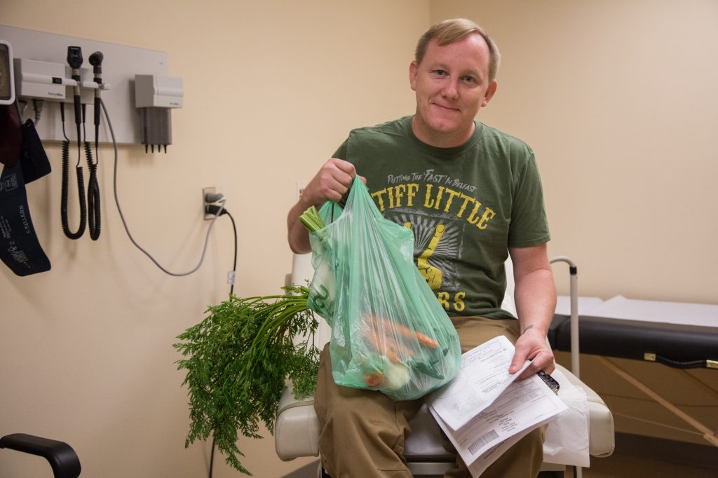 2018 10 01-e cohen- 30- patient kevin lawerence-lankenau hospital-wellness farm photos from farm to patient Kevin Lawerence, of Wynnewood, was pleasantly surprised to receive a fresh bag of groceries during his appointment at Lankenau Hospital's integrated health practice.
