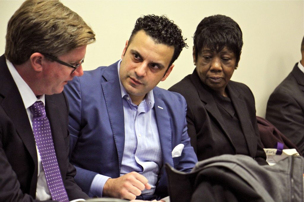 2018 11 07-e lee-paul j toner rahil raza vivian vanstory-philadelphia zoning board-development Developer Rahil Raza and Vivian VanStory consult with attorney Paul J. Toner during a Philadelphia zoning board meeting. (Emma Lee/WHYY)