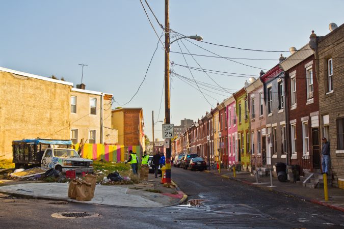 Members of Power Corp clean up around McPherson Square in Kensington. (Kimberly Paynter/WHYY)