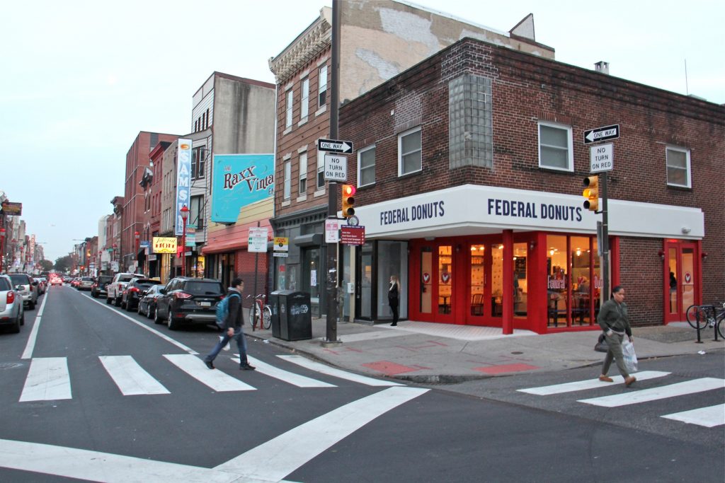 2018 11 19-e lee-philadelphia south street-businesses A new Federal Donuts recently opened on South Street at Sixth Street. (Emma Lee/WHYY)