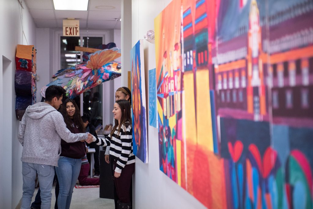 20181120_WHYY_Ohtli Award_D750_022 People stand in a hallway