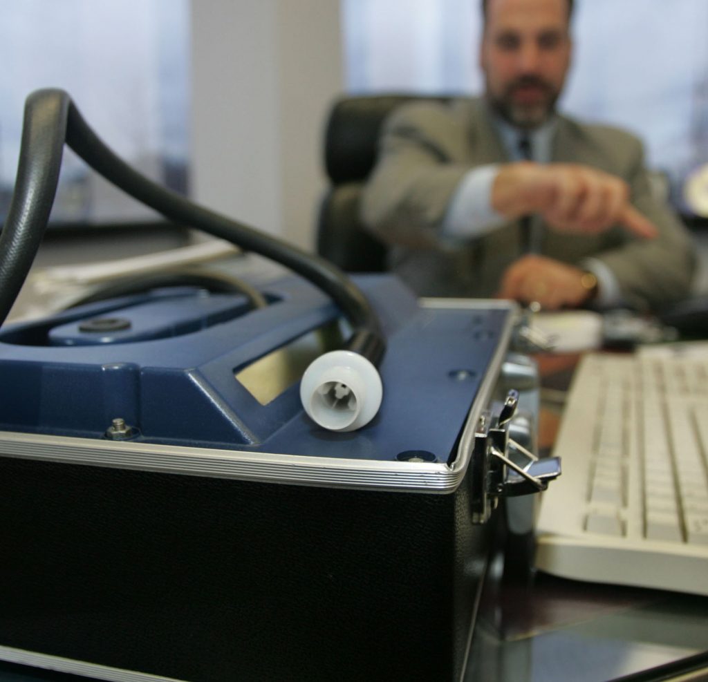 NEW BREATH TEST Cherry Hill, NJ lawyer Evan M. Levow is shown with an Alcotest 7110 MKIII-C machine at his office in Cherry Hill, N.J., in a Tuesday, Nov. 22, 2005 file photo. The Alcotest, the successor to the Breathalyzer machine, is under scrutiny as the state Supreme Court considers an appeal challenging whether the machine provides reliable blood-alcohol level readings. (Jose F. Moreno/AP Photo, File)