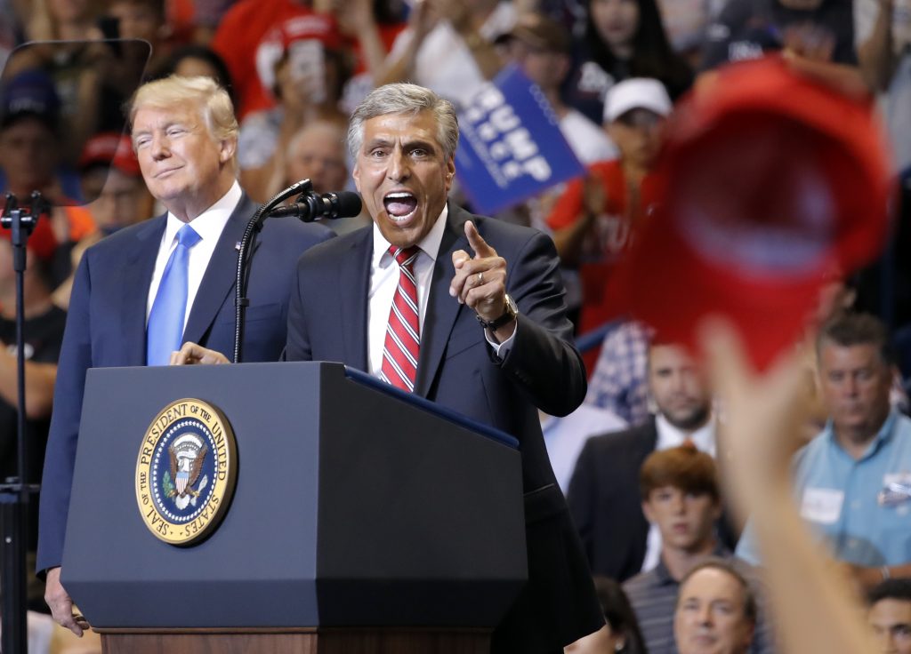 Donald Trump President Donald Trump listens to then-Senate candidate and U.S. Rep. Lou Barletta, R-Pa., speak during a rally, Thursday, Aug. 2, 2018, at Mohegan Sun Arena at Casey Plaza in Wilkes Barre, Pa. (AP Photo/Carolyn Kaster)