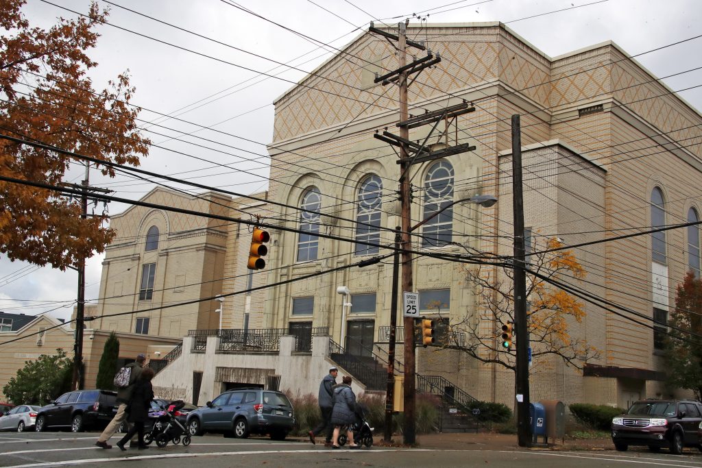 Shooting Synagogue Families arrive for Shabbat morning services at Beth Shalom Synagogue in the Squirrel Hill neighborhood of Pittsburgh, on Saturday, Nov. 3, 2018. (AP Photo/Gene J. Puskar)