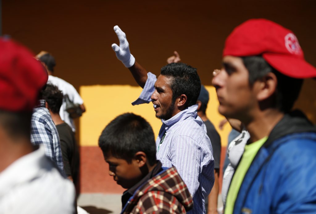 Central America Migrant Caravan A group of Central American migrants, representing the thousands participating in a caravan trying to reach the U.S. border, undertake an hours-long march to the office of the United Nations' humans rights body in Mexico City, Thursday, Nov. 8, 2018. Members of the caravan which has stopped in Mexico City demanded buses Thursday to take them to the U.S. border, saying it is too cold and dangerous to continue walking and hitchhiking.(AP Photo/Rebecca Blackwell)