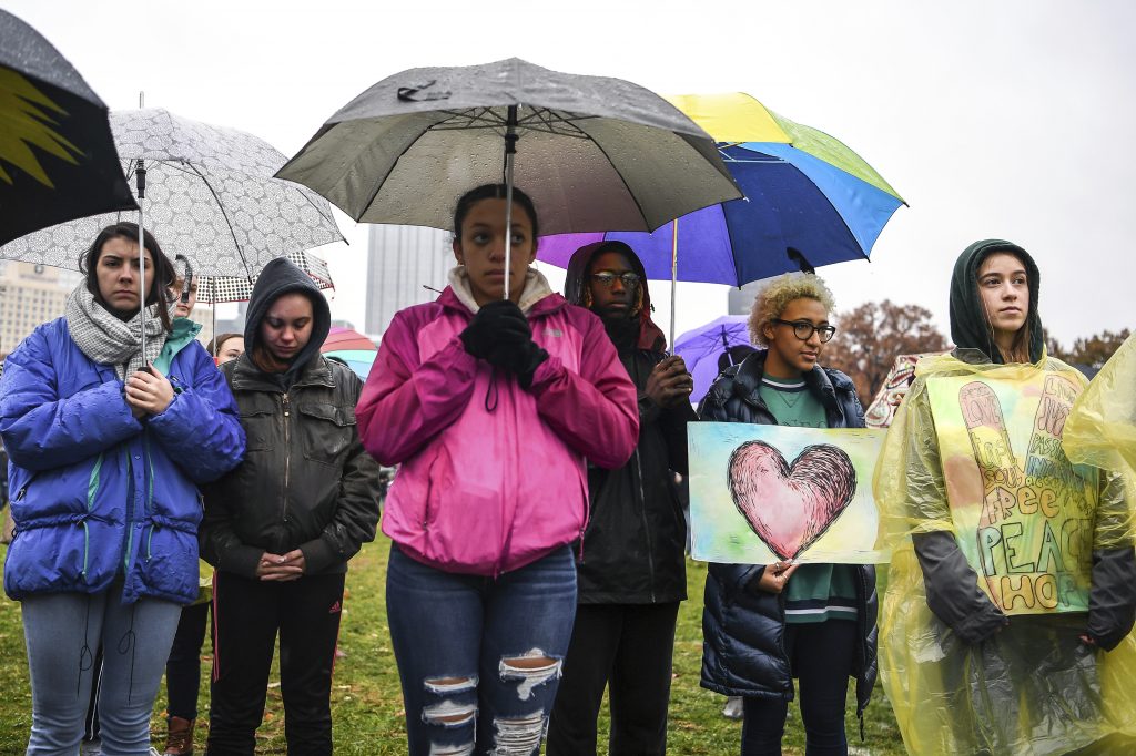 Shooting Synagogue Attendees stand during a moment of silence during the Rally for Peace and Tree of Life Victims, Friday, Nov. 9, 2018, at Point State Park in downtown Pittsburgh. (Alexandra Wimley/Pittsburgh Post-Gazette via AP)