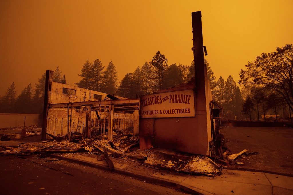 California Wildfires The walls of a scorched antique shop stand on Skyway after a wildfire burned through Paradise, Calif.