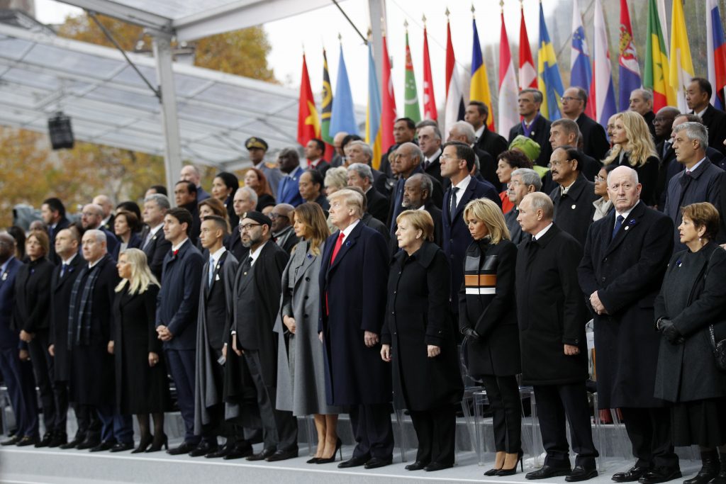 APTOPIX France WWI Centennial Heads of states and world leaders attend ceremonies at the Arc de Triomphe Sunday, Nov. 11, 2018 in Paris. Over 60 heads of state and government were taking part in a solemn ceremony at the Tomb of the Unknown Soldier, the mute and powerful symbol of sacrifice to the millions who died from 1914-18. (AP Photo/Francois Mori, Pool)