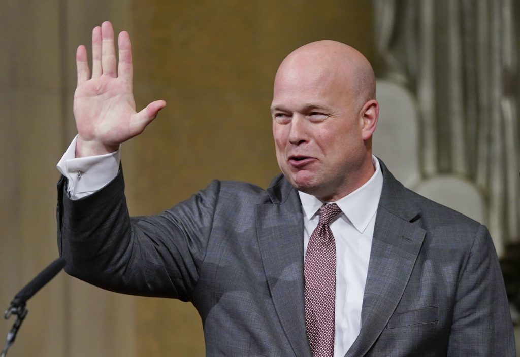 Matthew G. Whitaker Acting Attorney General Matthew Whitaker gestures after speaking at the Dept. of Justice's Annual Veterans Appreciation Day Ceremony, Thursday, Nov. 15, 2018, at the Justice Department in Washington. (AP Photo/Pablo Martinez Monsivais)