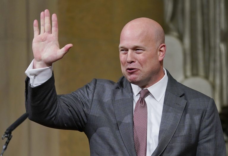 Acting Attorney General Matthew Whitaker gestures after speaking at the Dept. of Justice's Annual Veterans Appreciation Day Ceremony, Thursday, Nov. 15, 2018, at the Justice Department in Washington. (AP Photo/Pablo Martinez Monsivais)