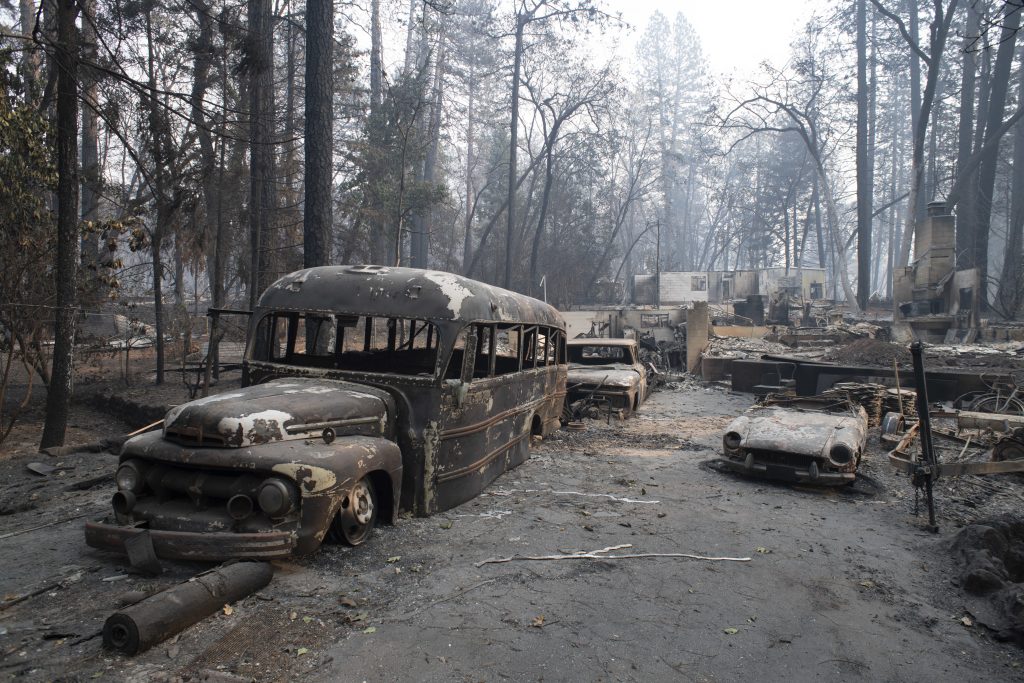 CA: Camp fire aftermath Burnt vehicles are seen in front of a destroyed house in Paradise, California, United States on November 16, 2018. Camp Fire has burnt so far 142,000 acres and is at 45% contained by Cal Fire. The death toll from the wild fire climbed to 63 with 631 on missing list. (Yichuan Cao/Sipa USA)(Sipa via AP Images)