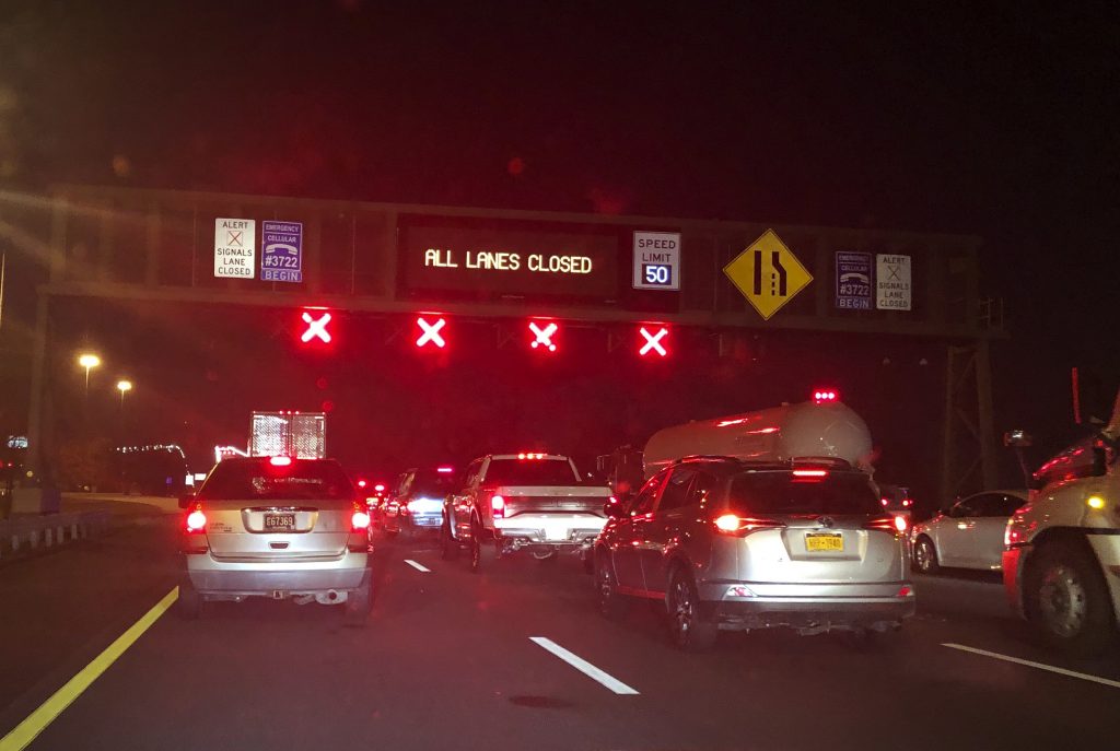 Delaware Bridge Gas Leak This photo provided by Lashrecse Aird shows traffic jam and an electric message sign indicating,