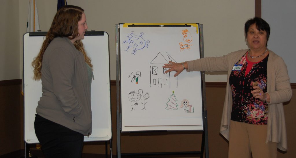 Carol Erzen (right) of Merakey Allegheny Valley School in Pittsburgh trains special-needs caregivers in how to identify signs of Alzheimer’s and dementia and adjust a patient’s surroundings accordingly. (Merakey Allegheny Valley School) 