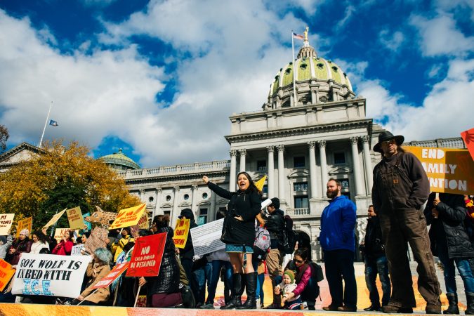 Jasmine Rivera from Shut Down Berks Coalition demands the end of family detention. (Dani Fresh for WHYY)