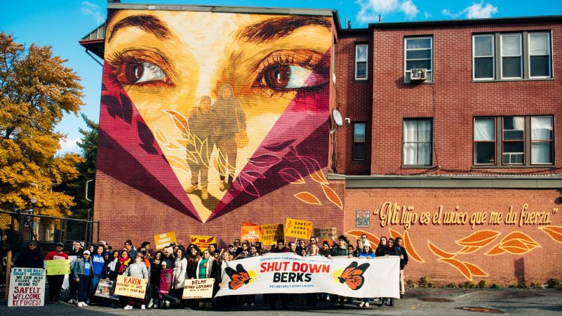 Ortiz dedicated the mural in Allison Hill neighborhood of Harrisburg to the immigrant community living there. (Dani Fresh for WHYY)