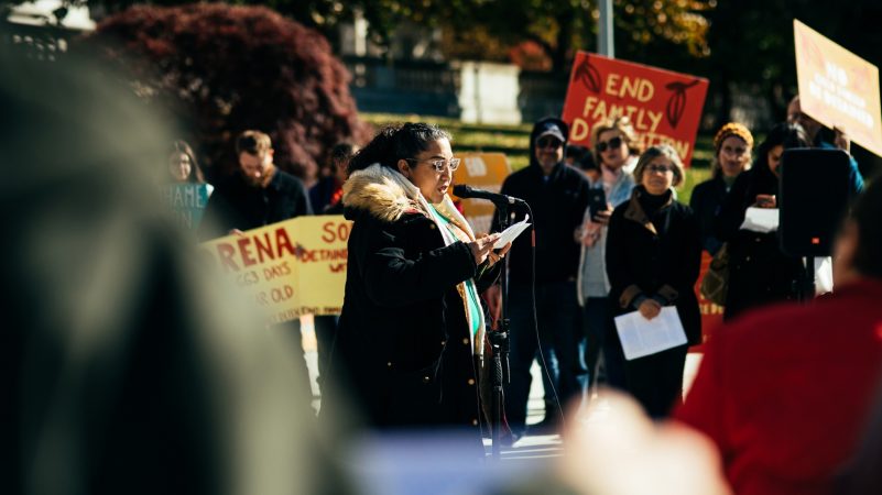 Olivia Ponce reads text from interviews conducted by Michelle Angela Ortiz with mothers formerly detained at the Berks County facility. (Dani Fresh for WHYY)