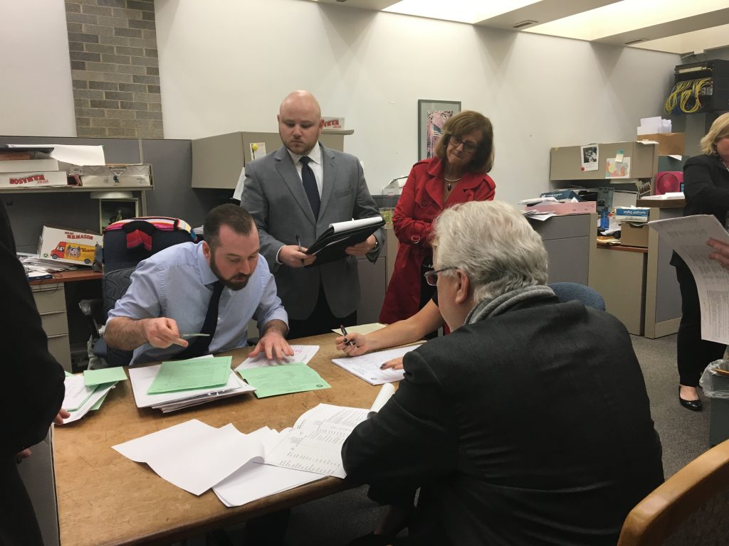 IMG_1334 Election workers pore over Pennsylvania Senate's 6th District race in the Bucks County Courthouse. (Katie Meyer/WITF)
