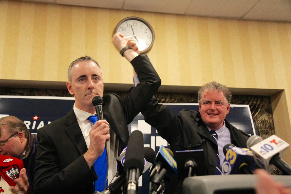 IMG_2620 Brian Fitzpatrick celebrates his reelection with his brother, and former congressman, Mike Fitzpatrick. (Kimberly Paynter/WHYY)