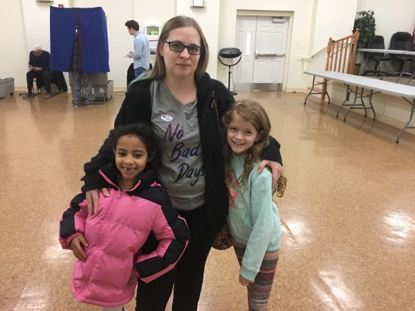 Krystie Smoot brought her kids with her to vote today. She said she voted straight Democrat. “I want to hopefully do some change.” (Taylor Allen/WHYY)