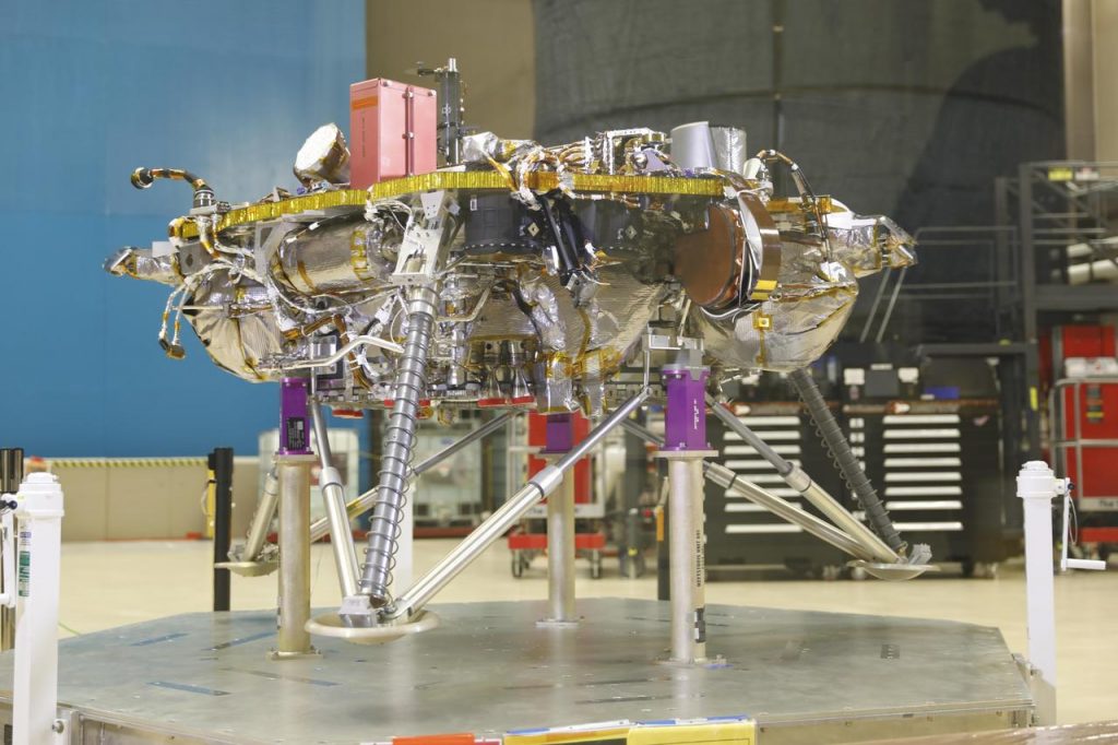 PIA22572_medium Once NASA's InSight Mars lander enters the Martian atmosphere and approaches the planet's surface, propulsive landing gear will slow the spacecraft down to about 5.5 mph (8.8 km/h) and safely set it down on the surface of the Red Planet. This image, taken at Lockheed Martin Space in Littleton, Colorado, shows several of the critical landing systems including the thrusters, lander legs and science deck. (NASA)