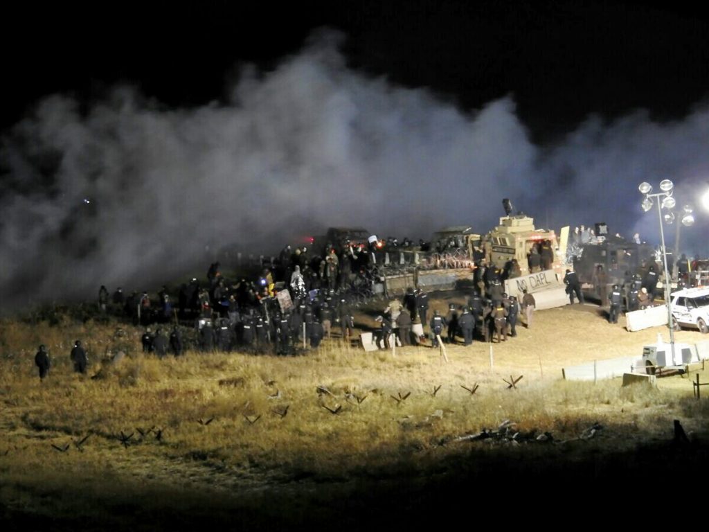 Law enforcement and protesters clash near the site of the Dakota Access pipeline in Cannon Ball, N.D., in November 2016. Law enforcement and protesters clash near the site of the Dakota Access pipeline in Cannon Ball, N.D., in November 2016.
(Morton County Sheriff's Department/AP)