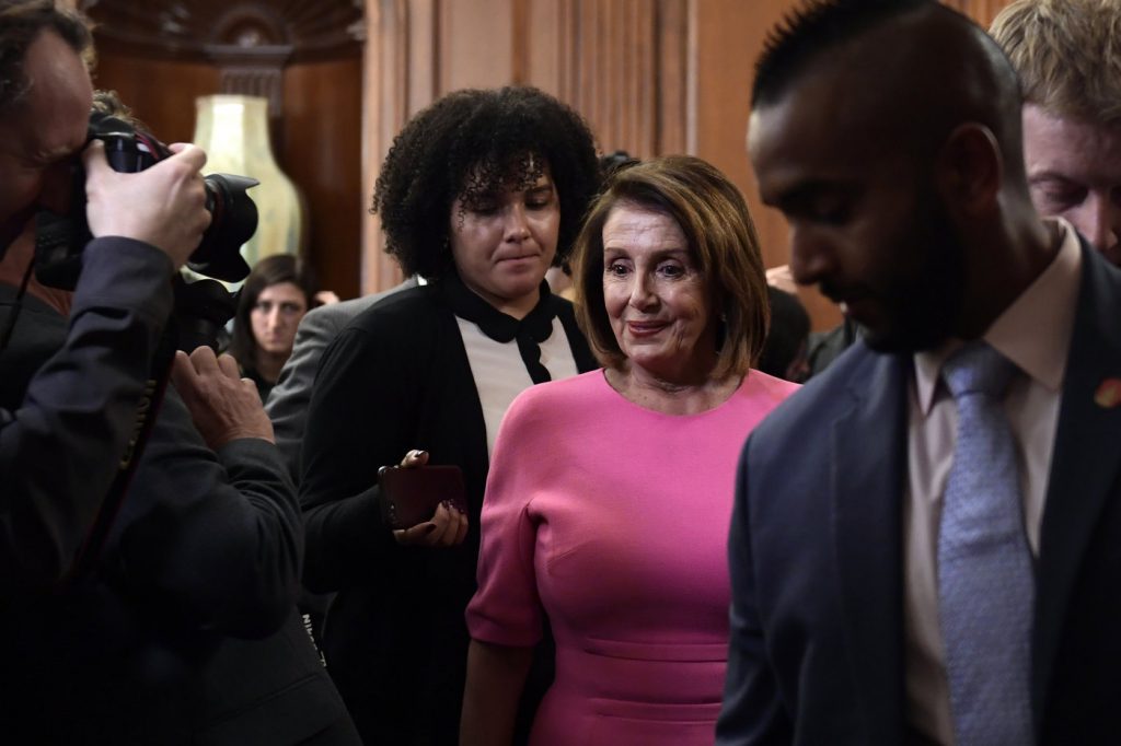 ap_18311695117114_slide-5116abfa18aebac6910a1be52d8051834f50e288-s1400-c85 House Minority Leader Nancy Pelosi leaves a news conference on Capitol Hill on Wednesday. (Susan Walsh/AP)