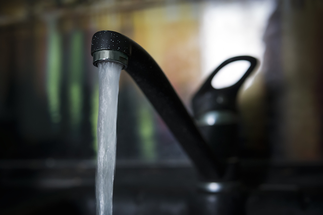 Water Leakage From The Tap Water runs from a tap. (WHYY)