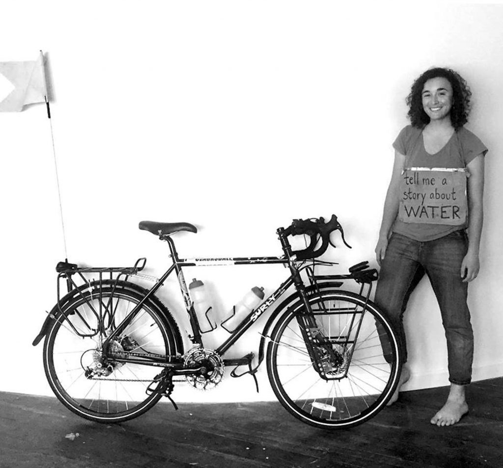 devi_lockwood_bike_2100 For four years, Devi Lockwood has been traveling around the world to record 1,001 stories about water and climate change. (Image courtesy of Devi Lockwood)