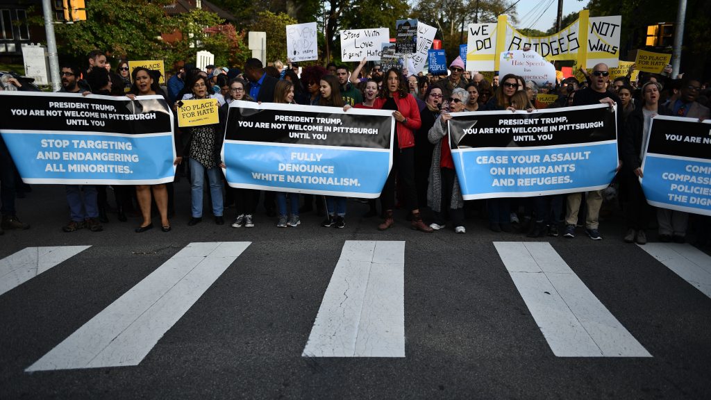 People protesting against President Trump gather near the Tree of Life Congregation on Wednesday in Pittsburgh, Pa. People protesting against President Trump gather near the Tree of Life Congregation on Wednesday in Pittsburgh, Pa. (Brendan Smialowski/AFP/Getty Images)