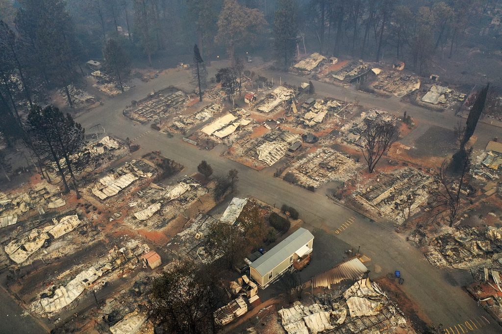An aerial view of a neighborhood destroyed by the Camp Fire in Paradise, Calif. Fueled by high winds and low humidity, the wildfire ripped through the town, charring more than 140,000 acres and killing more than 60 people. An aerial view of a neighborhood destroyed by the Camp Fire in Paradise, Calif. Fueled by high winds and low humidity, the wildfire ripped through the town, charring more than 140,000 acres and killing more than 60 people.
(Justin Sullivan/Getty Images)