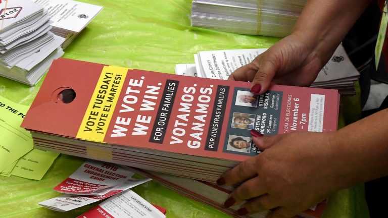 Door hangers are stacked after a rally with Jacky Rosen, a Democrat who later won her Senate race, at the Culinary Workers Union Hall Local 226 on Nov. 5 in Las Vegas. Organizations like the Culinary Workers Union made a big push to engage Latinos in 2018 (Ethan Miller/Getty Images)
