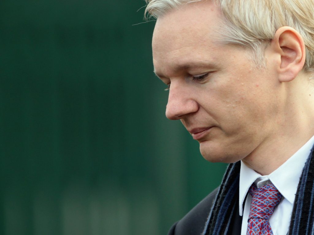 WikiLeaks founder Julian Assange could soon be facing criminal charges from the Department of Justice, according to language discovered in an unrelated court document by terrorism researcher Seamus Hughes. WikiLeaks founder Julian Assange could soon be facing criminal charges from the Department of Justice, according to language discovered in an unrelated court document by terrorism researcher Seamus Hughes. (Dan Kitwood/Getty Images)
