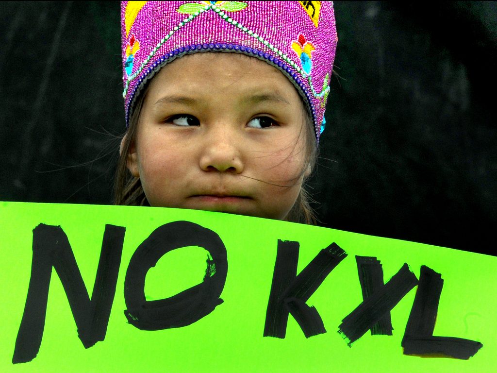 Shawnee Rae, age 8, among a group of Native American activists from the Sisseton-Wahpeton tribe protesting the Keystone XL Pipeline in Watertown, S.D. in 2015. Shawnee Rae, age 8, among a group of Native American activists from the Sisseton-Wahpeton tribe protesting the Keystone XL Pipeline in Watertown, S.D. in 2015.