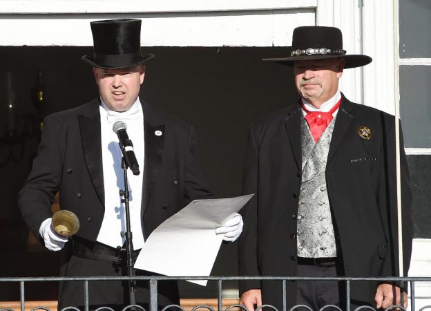 The town crier calls out the results of Tuesday's election in Georgetown, Delaware on Thursday afternoon, November 8. (Chuck Snyder/for WHYY)