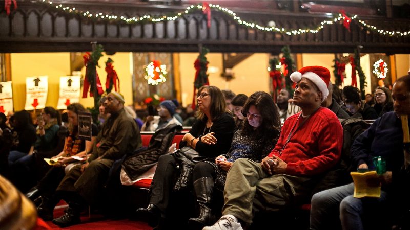 Philadelphians, some formerly and currently homeless, attended a Homeless Memorial Day service at Arch Street United Methodist Church Thursday evening. (Brad Larrison for WHYY)