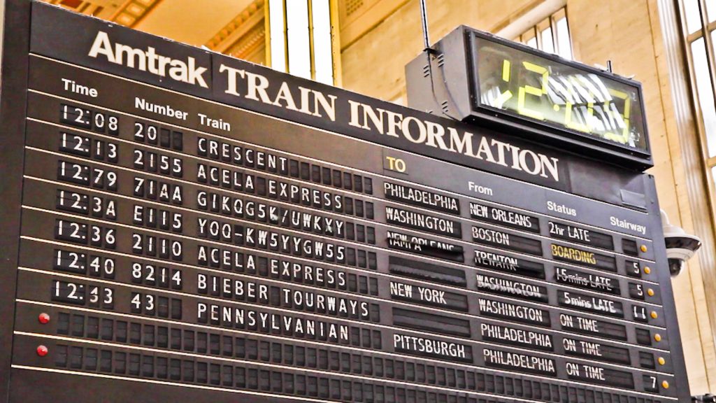 The flip-board sign at 30th Street is the last of its kind still in service at an Amtrak station (Kimberly Paynter/WHYY)