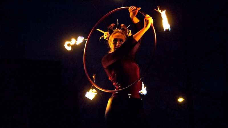 A fire dancer performs the 2018 Parade of Spirits. (Kimberly Paynter/WHYY)