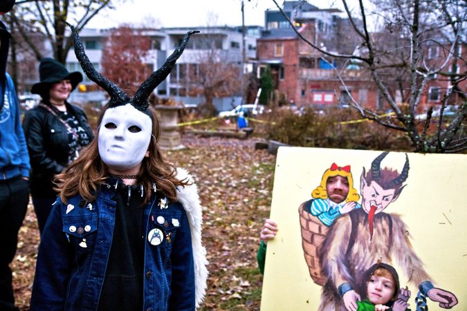A popular costume at the Parade of Spirits is that of the Krampus, a creature from central European folklore, half goat and half demon, who punishes naughty children. (Kimberly Paynter/WHYY)