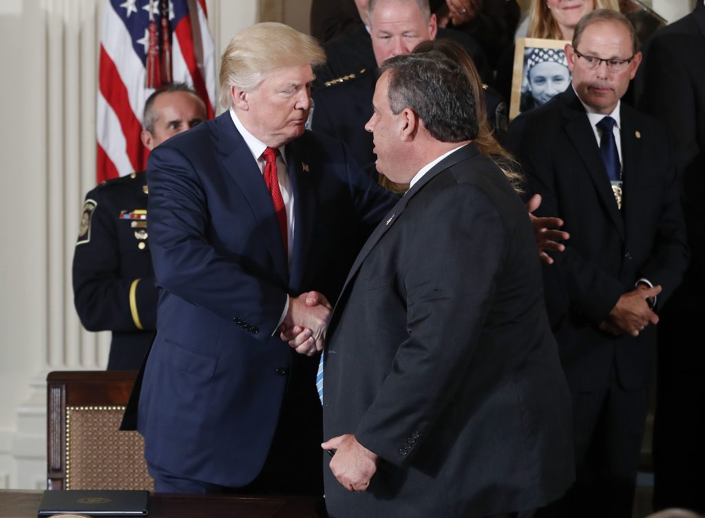 Donald Trump, Chris Christie In this file photo, President Donald Trump shakes hands with New Jersey Gov. Chris Christie Thursday, Oct. 26, 2017, in Washington. (Pablo Martinez Monsivais/AP Photo)