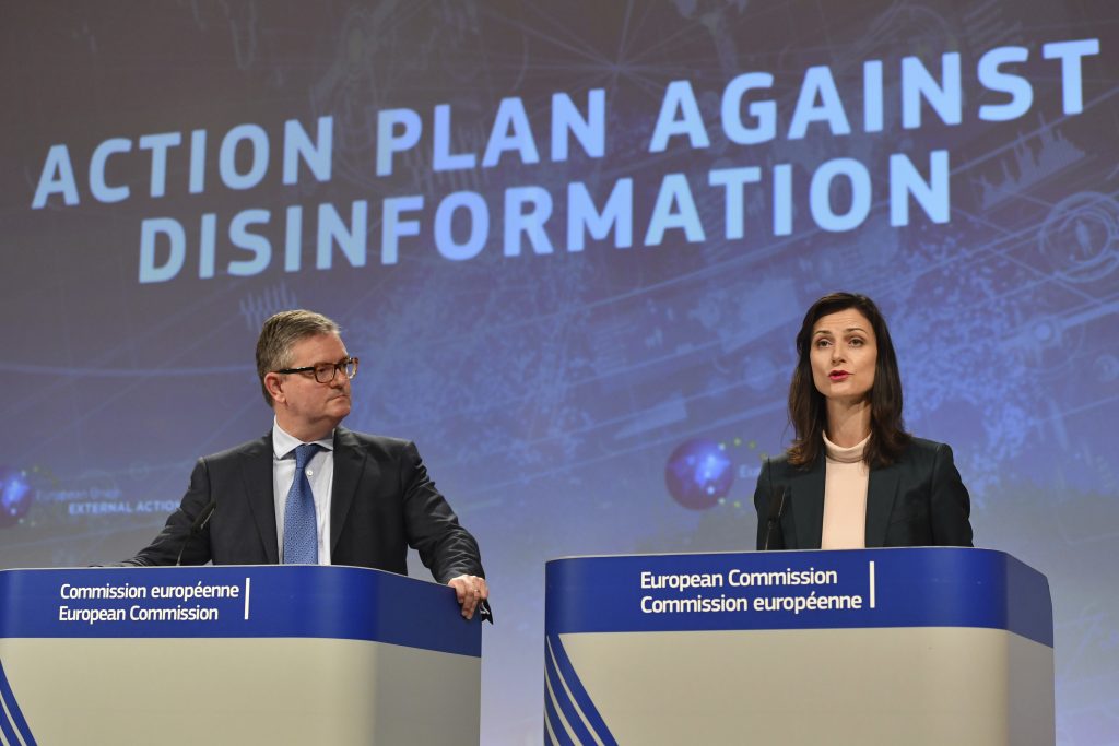 European Commissioner for Security Union Julian King, (left), and European Commissioner for Digital Economy Marija Gabriel participate in a media conference at EU headquarters in Brussels, Wednesday Dec. 5, 2018. The European Commission on Wednesday reported on an Action Plan to counter disinformation and the progress achieved so far. (Geert Vanden Wijngaert/AP Photo)