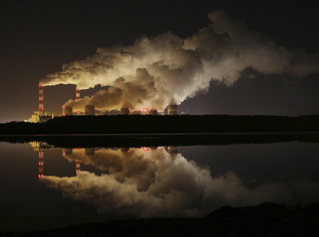 Climate Emissions 2018 In this Wednesday, Nov. 28, 2018 file photo, plumes of smoke rise from Europe's largest lignite power plant in Belchatow, central Poland. After several years of little growth, global emissions of heat-trapping carbon dioxide surged in 2018 with the largest jump in seven years, discouraged scientists announced Wednesday, Dec. 5, 2018. (Czarek Sokolowski/AP Photo)